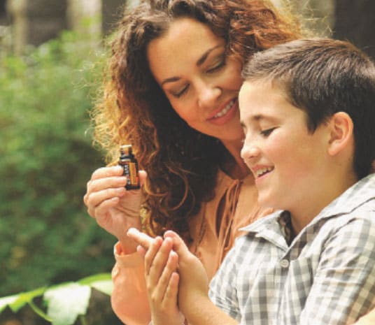 Mother and Son using dōTERRA products